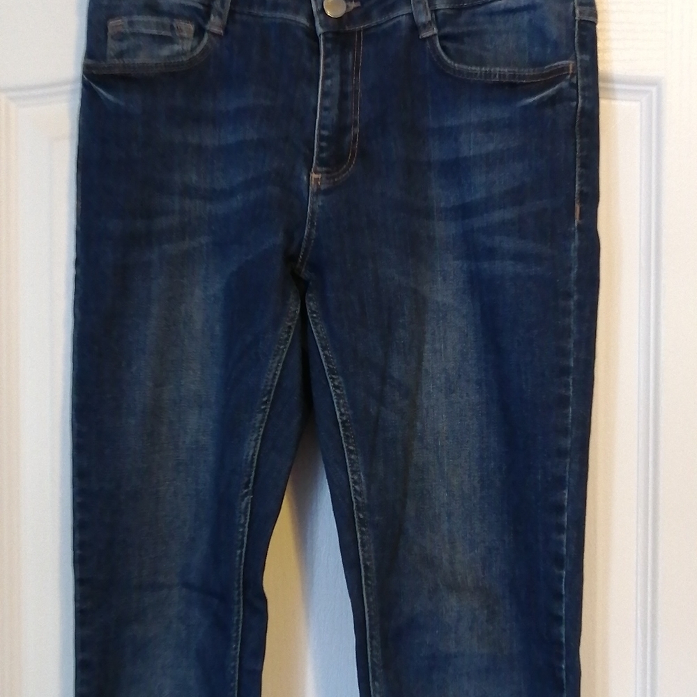 Dark wash 5 pocket skinny jeans, company is SET, lots of stretch,